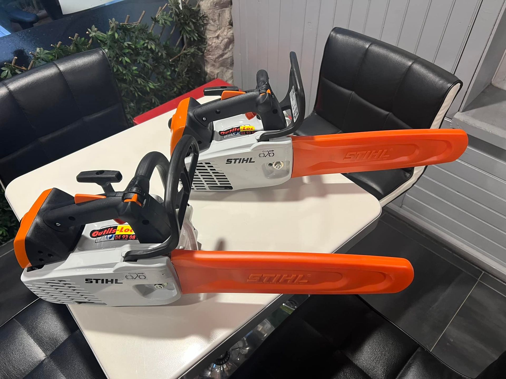 Double tronçonneuse orange