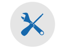 Llave inglesa azul y destornillador cruzados sobre un círculo gris.