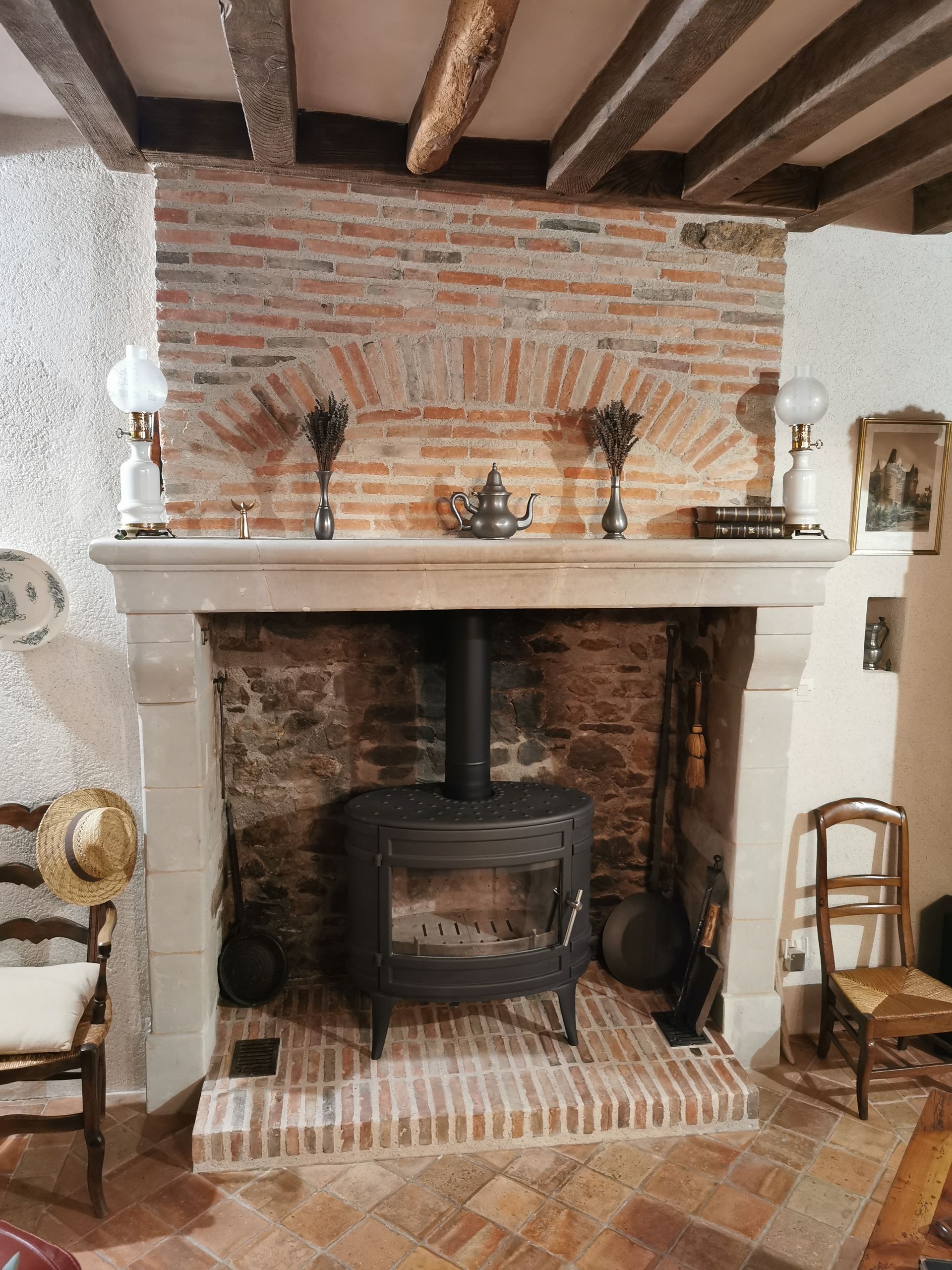 Cheminée ancienne avec insert à bois