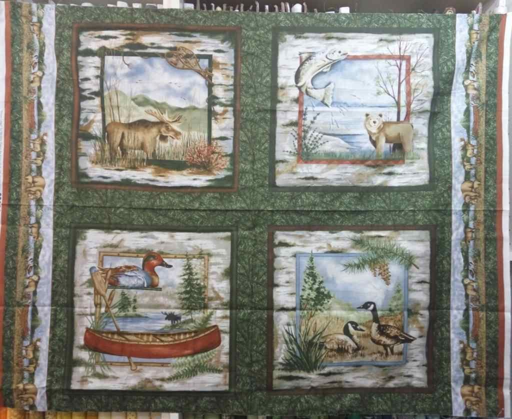 Un trozo de tela con cuatro dibujos de animales.