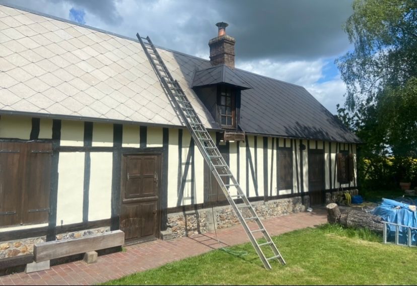 Nettoyage d'une toiture en ardoise