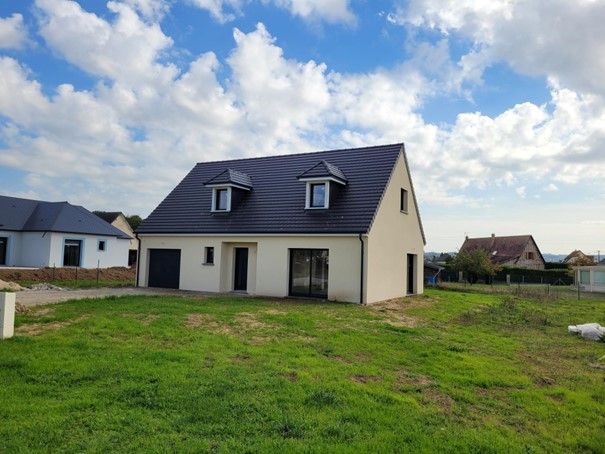 Maison avec deux lucarnes sur le toit