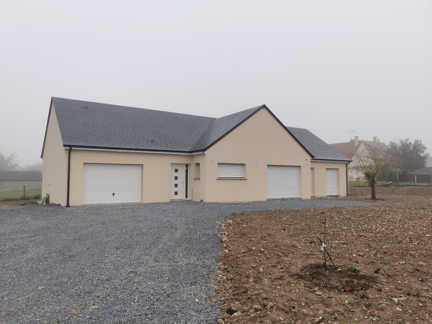 Grande maison en forme de T