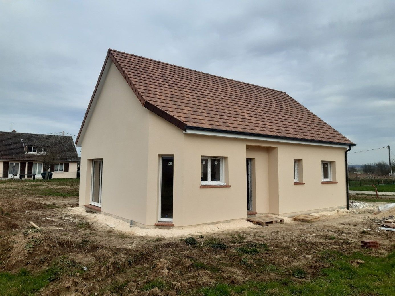 Maison avec tuiles de différentes couleurs