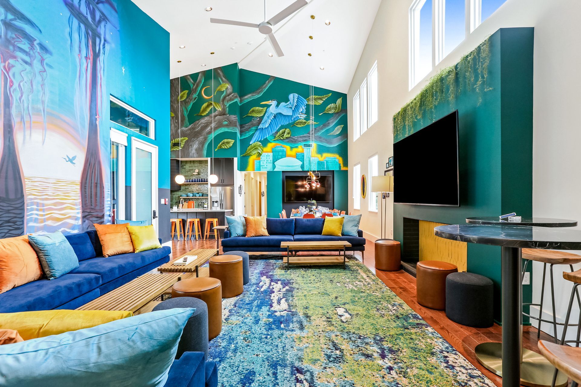 A living room filled with furniture and a flat screen tv.