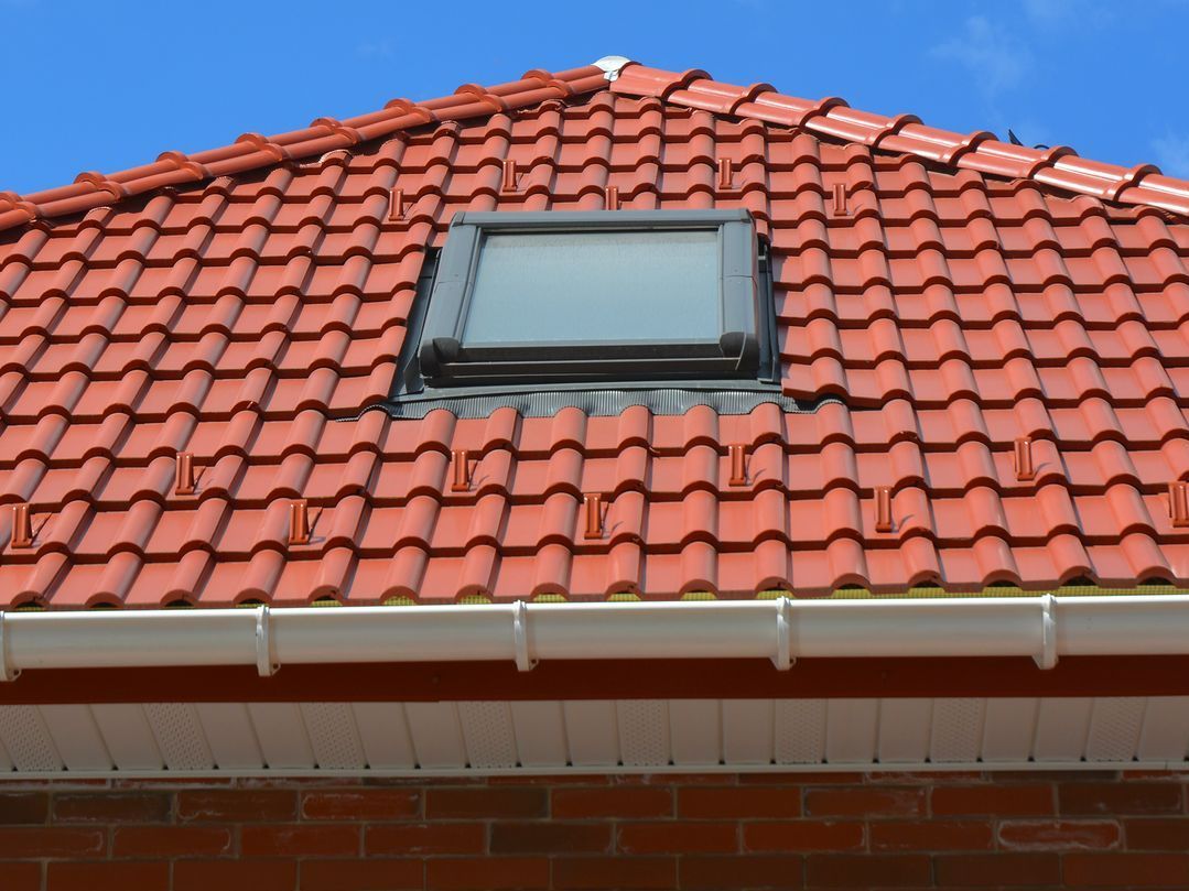 Velux sur une pointe de toit