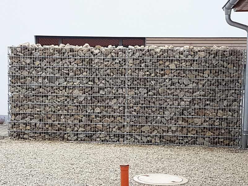 DHK-Bau GmbH & Co. KG, Hasenlohe 9, Neustadt a. d. Aisch, Referenzen, Baustelle, Natursteine, Bodenpressungen, Gabionen zur Hangsicherung, Terrassenanlage, Natursteinmauer, Zertifikate