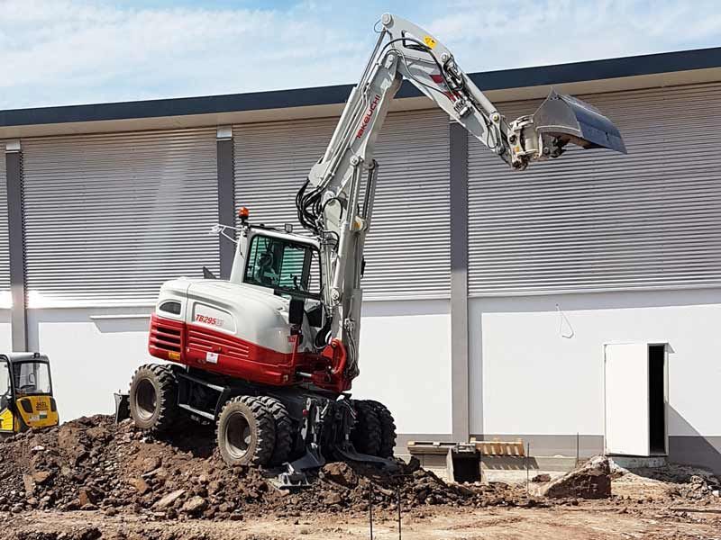 DHK-Bau GmbH & Co. KG, Hasenlohe 9, Neustadt a. d. Aisch, Erdbau und Aushub von Baugruben, Kanalbau und Kabelbau, Versorgungsleitungen