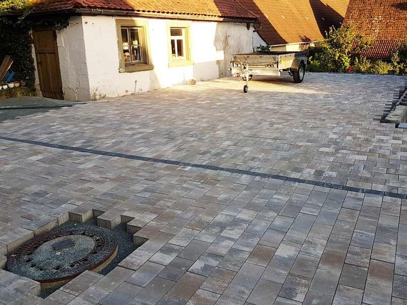 DHK-Bau GmbH & Co. KG, Hasenlohe 9, Neustadt a. d. Aisch, Pflasterarbeiten, Natursteintreppenanlagen, Teichanlagen und Poolanlagen, Terrassenanlagen und Fundamente, Natursteinmauern und Trockensteinmauern