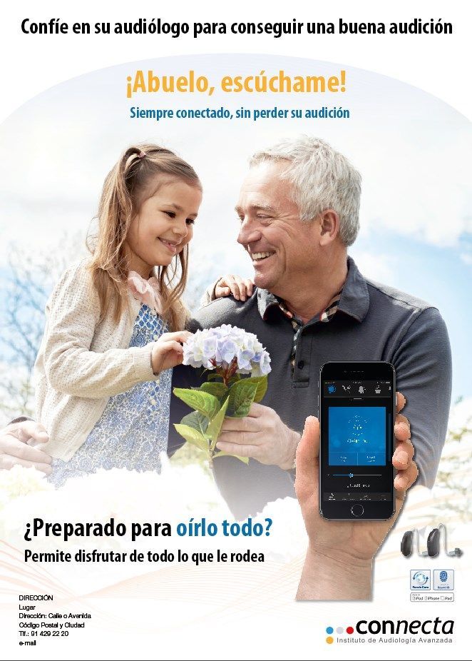 Un hombre sostiene un teléfono celular y una niña sostiene flores.