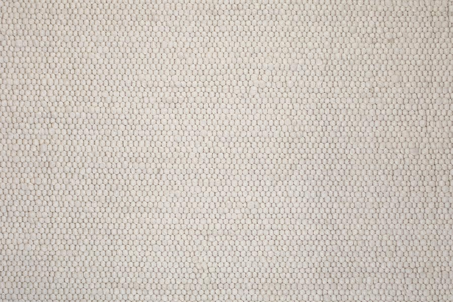 Eine Nahaufnahme einer weißen Stoffstruktur.