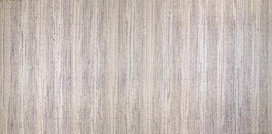 Eine Nahaufnahme einer grau gestreiften Stoffstruktur.