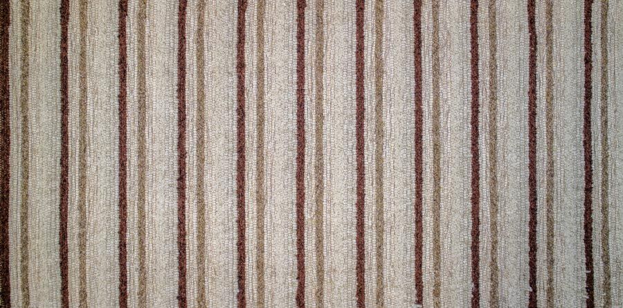 Eine Nahaufnahme eines braun-weiß gestreiften Stoffes.