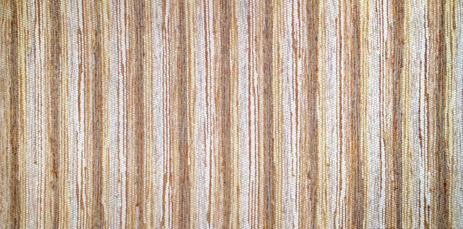 Eine Nahaufnahme einer Holzoberfläche mit einem Streifenmuster.