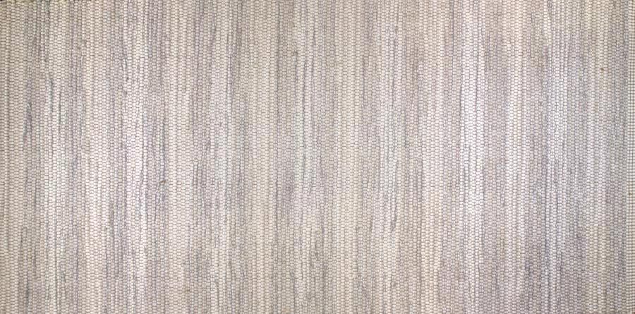 Eine Nahaufnahme einer grau gestreiften Stoffstruktur.