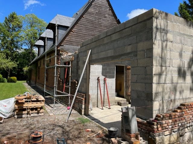 Extension de maison en lattes de bois