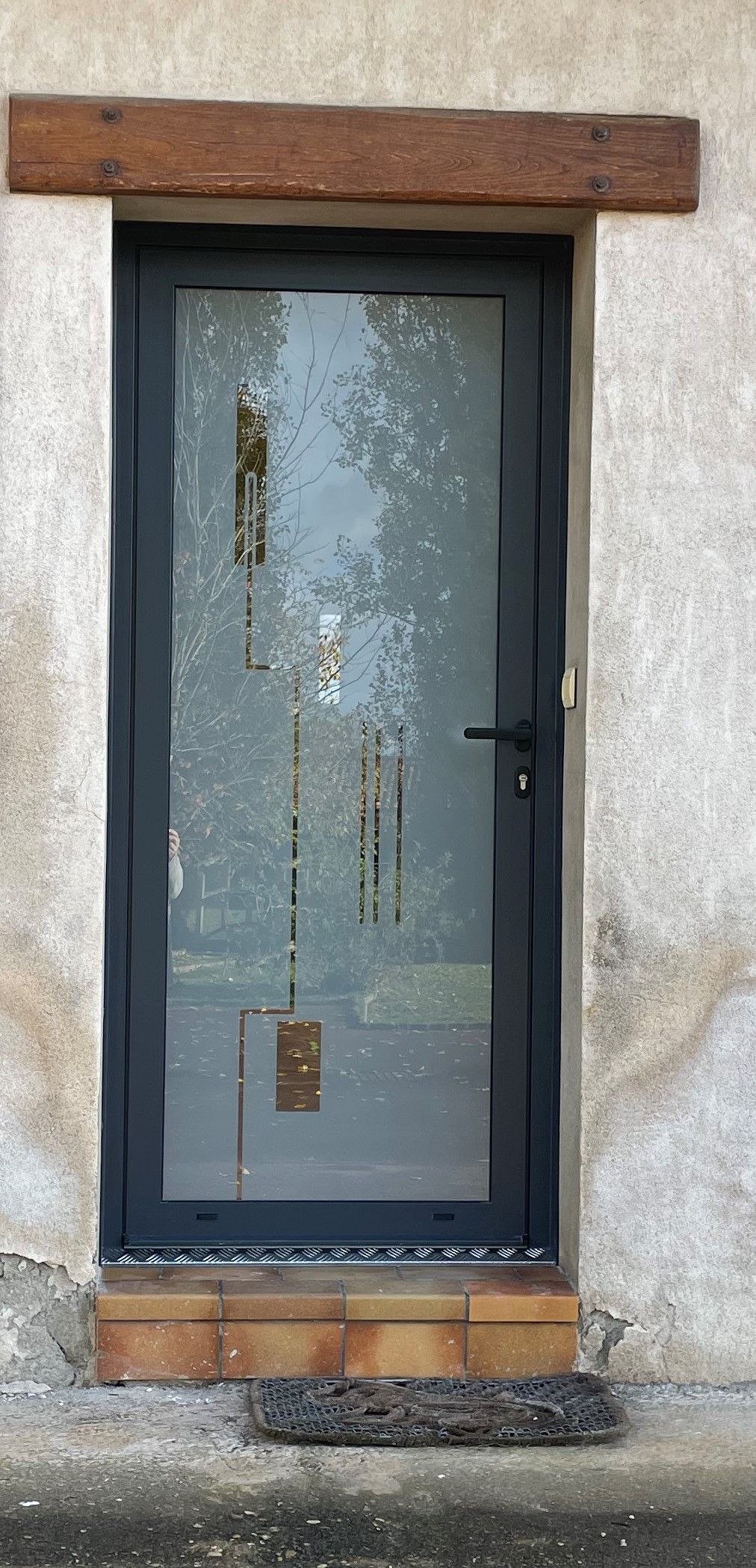 Porte d'entrée avec un vitrage décoratif