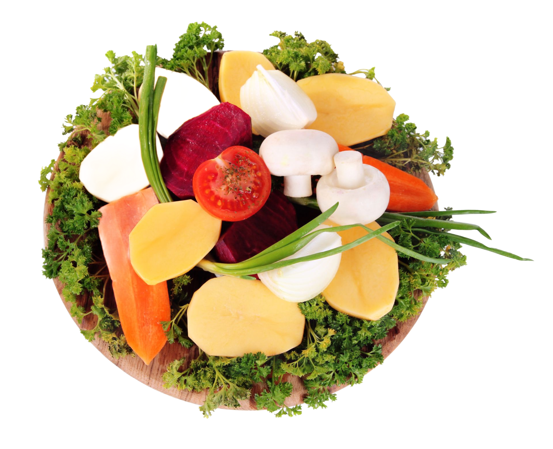 Salade circulaire composée de légumes colorés variés, sur un lit de verdure.