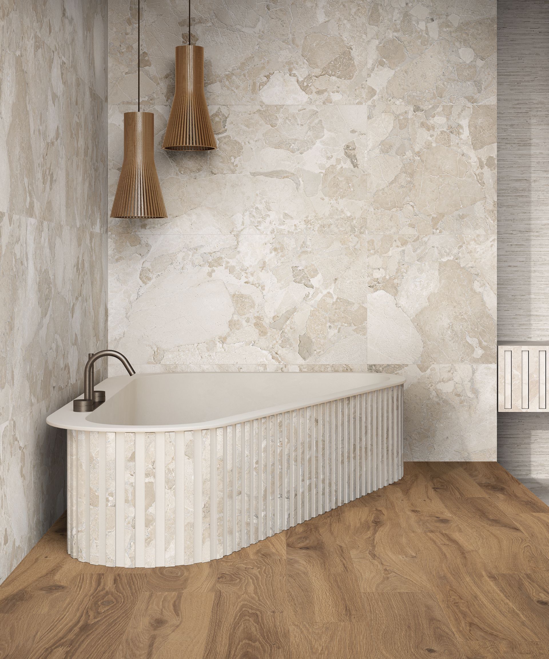 Salle de bains moderne et minimaliste avec baignoire îlot, mur en pierre texturée, parquet et deux appliques murales en cuivre.