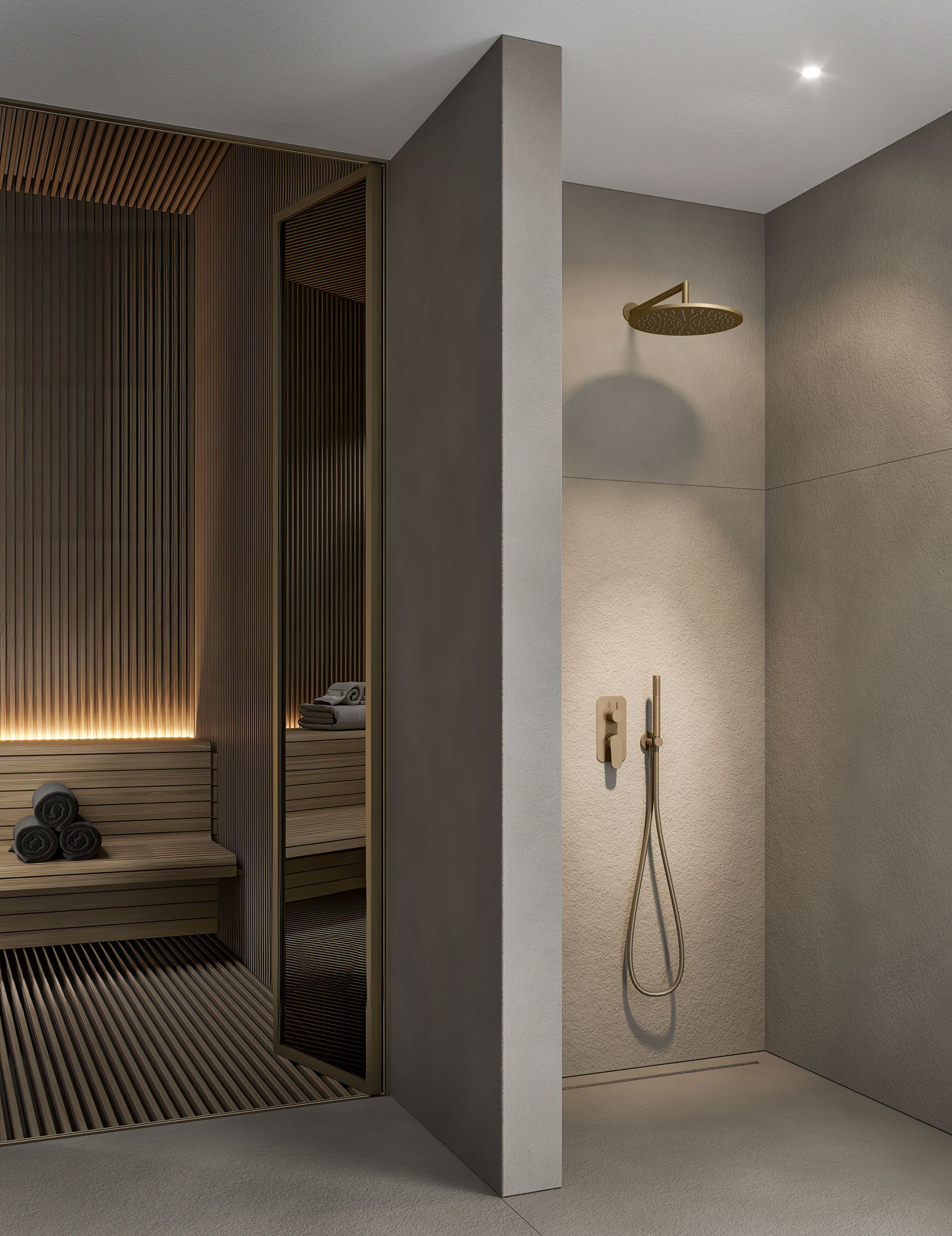 Coin douche spa moderne avec murs en pierre texturée, pommeau de douche effet pluie et flexible suspendu à côté d'un coin salon avec rideau.