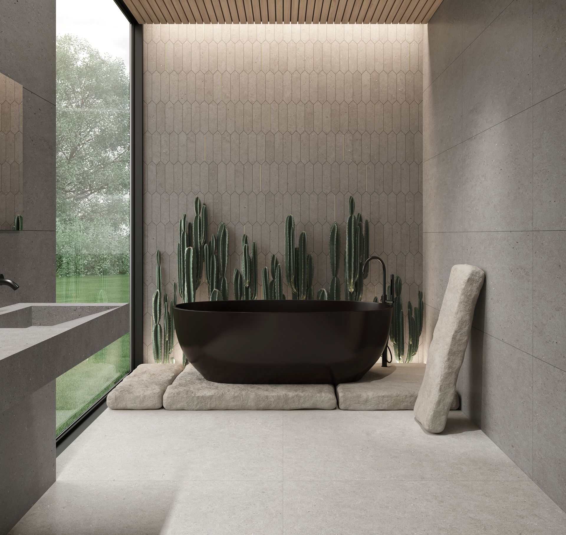 Salle de bains moderne et minimaliste avec une baignoire ovale noire, un banc en pierre et un grand cactus près d'une baie vitrée.