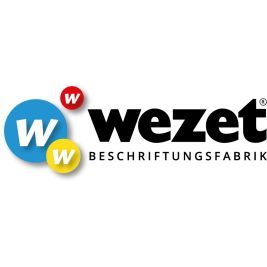 Ein Logo für eine Firma namens Wezet Beschriftungsfabrik