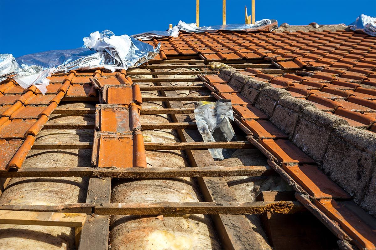 Rénovation de toiture et remplacement de tuiles