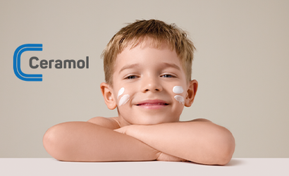 Bambino con in mano un tubetto di crema e accanto la scritta Ceramol nel cuore della barriera