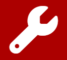 Un icono de llave inglesa blanca sobre un fondo rojo.