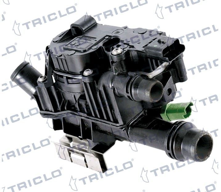 Un termostato negro con una manguera verde conectada a él.