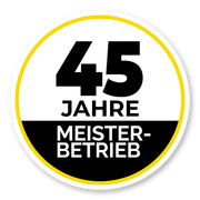 Rundes Abzeichen, schwarz und gelb, zum 45-jährigen Jubiläum.