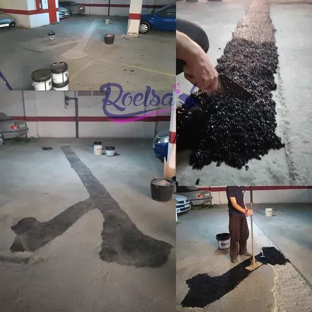 La palabra roelsa está en la pared de un garaje.