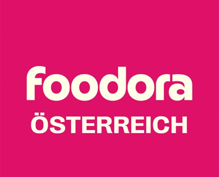 Das Logo von Foodora Österreich ist auf rosa Hintergrund