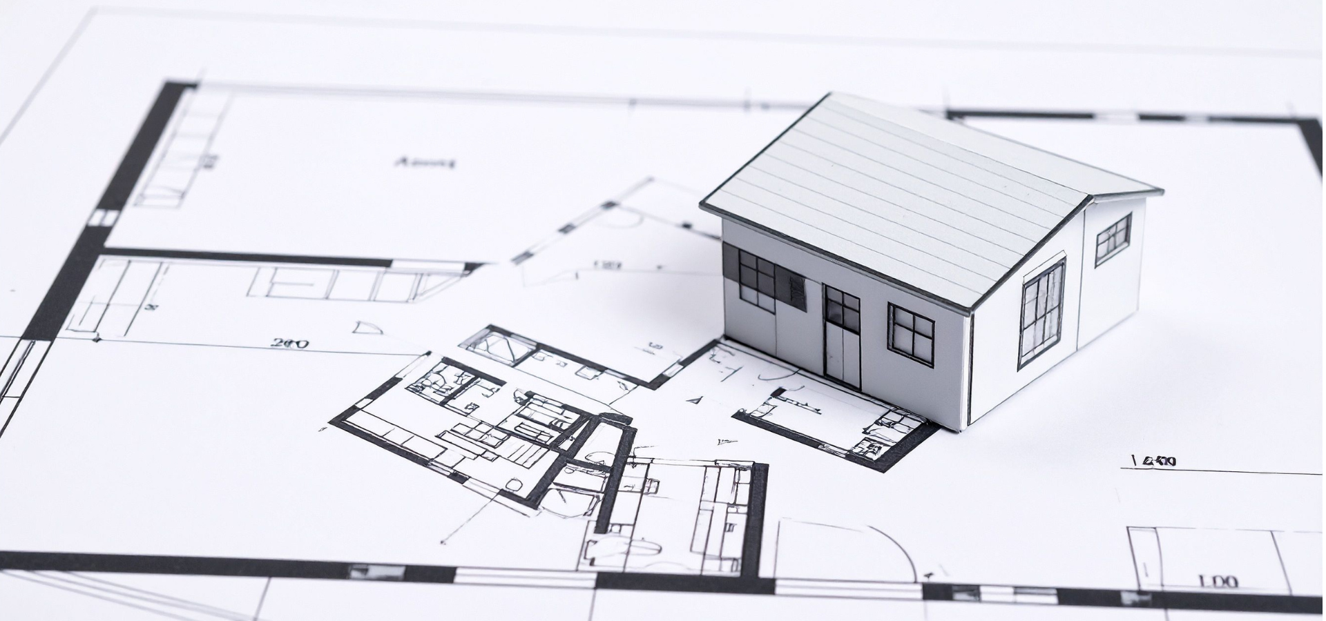 Modèle de maison sur plan d'architecte.