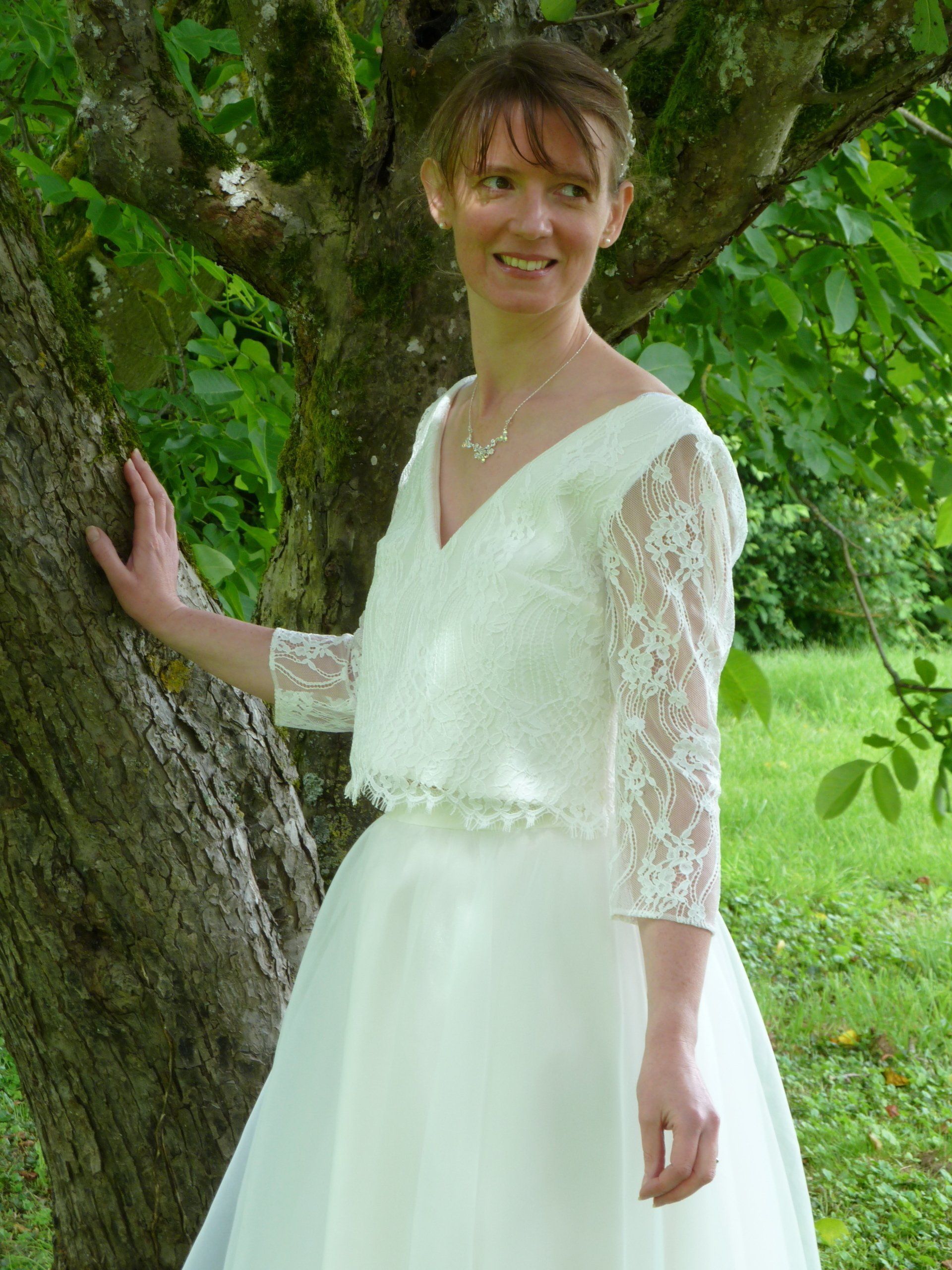 Haut de la robe avec manches longues dentelle