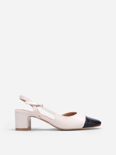 Talon slingback beige avec bout noir.