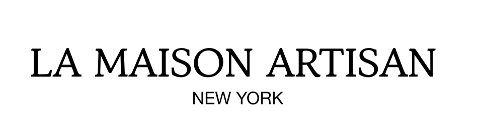 A black and white logo for la maison artisan new york