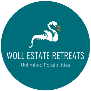 Woll estate retreats logo