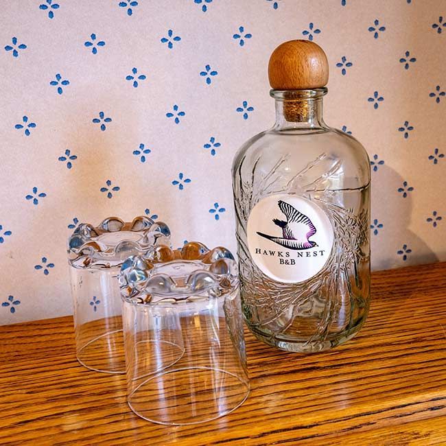 Hawks Nest Bed & Breakfast water bottle and glasses
