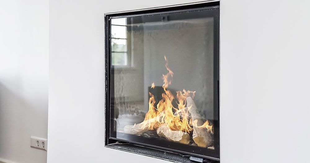 Protection de cheminée en verre