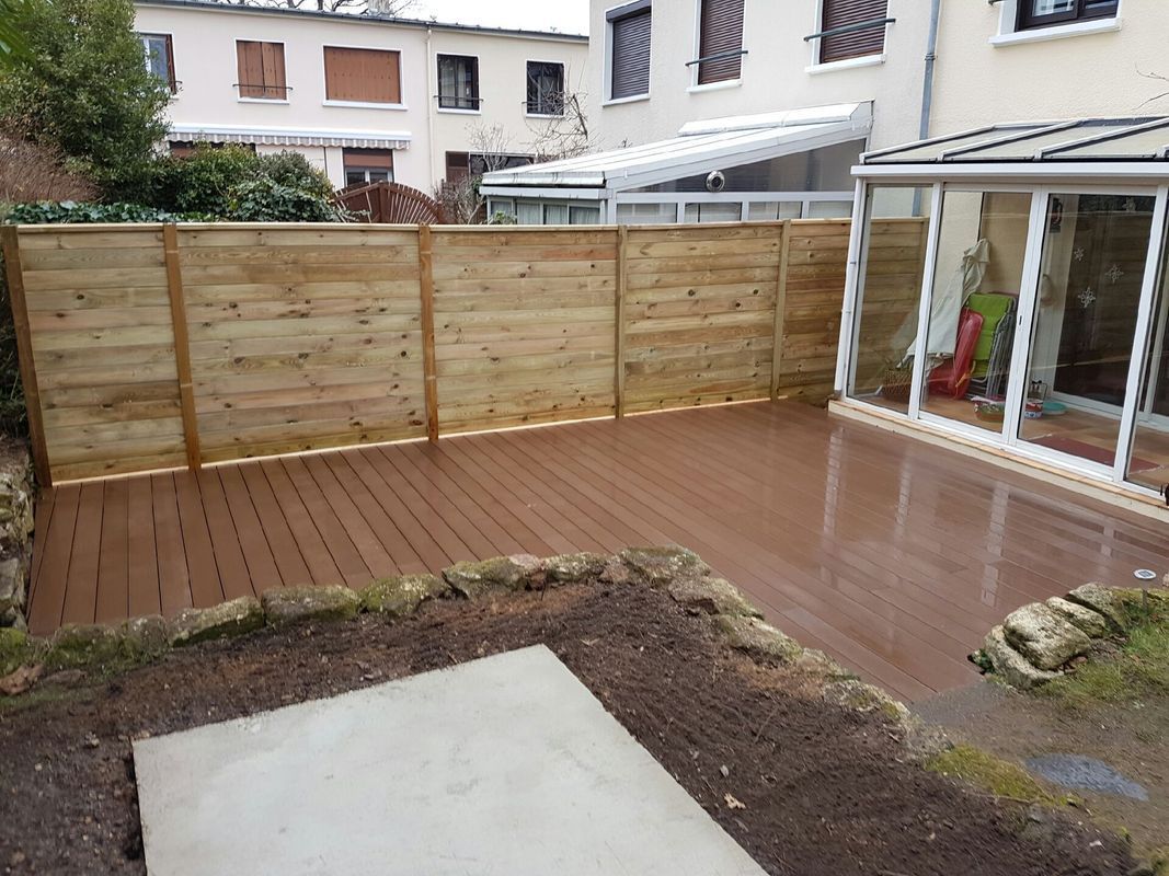 Terrasse d'une maison avec véranda