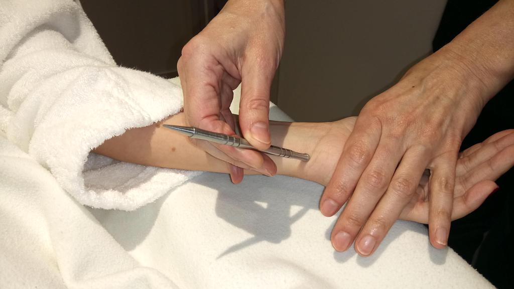 Stimulation des points d'acupuncture par stylet