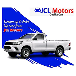 An ad for jcl motors quality cars shows a white truck