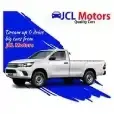 JCL Motors An ad for jcl motors quality cars shows a white truck
