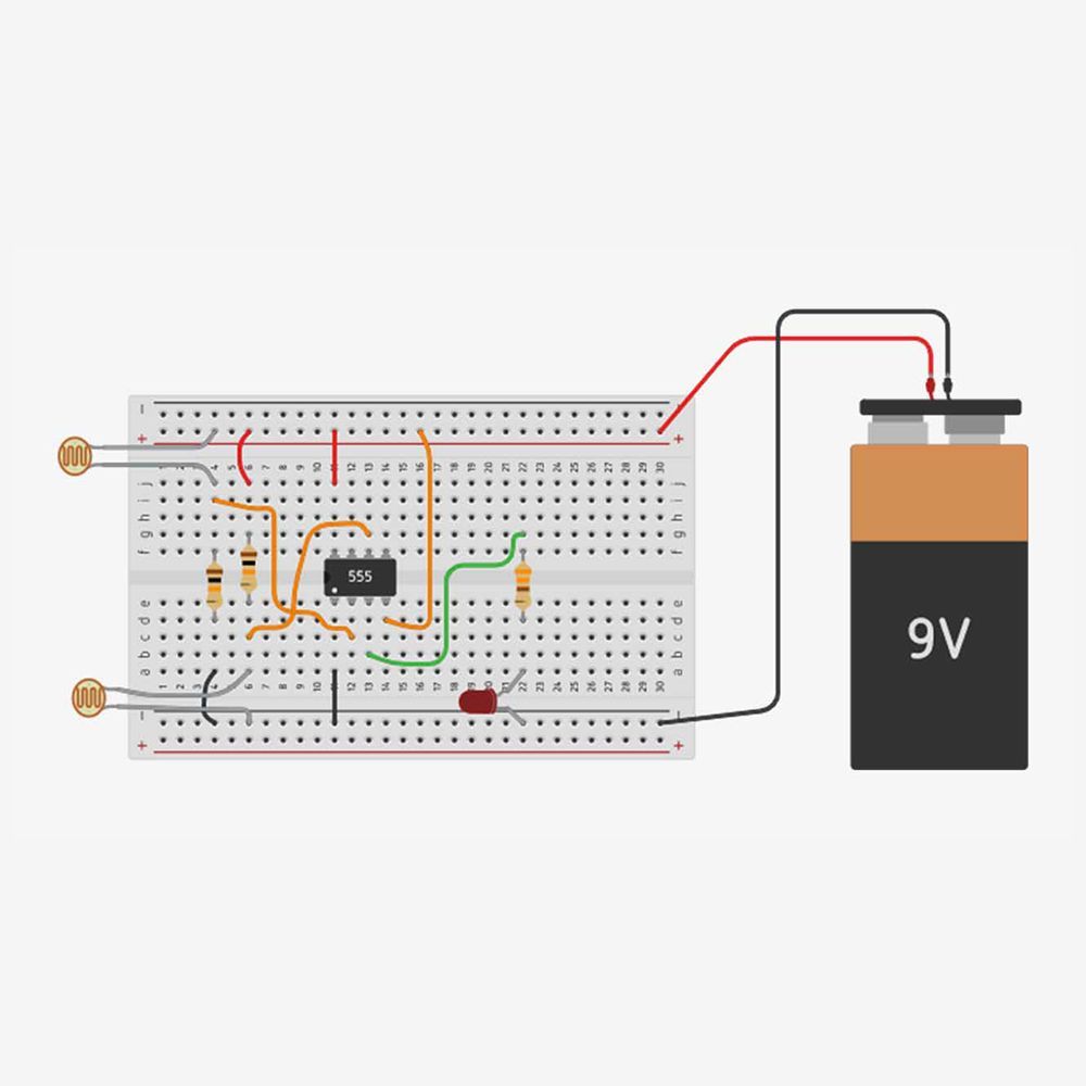 A diagram of a circuit board with a battery connected to it.