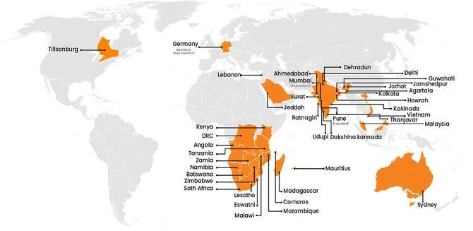 A map of the world with orange spots on it