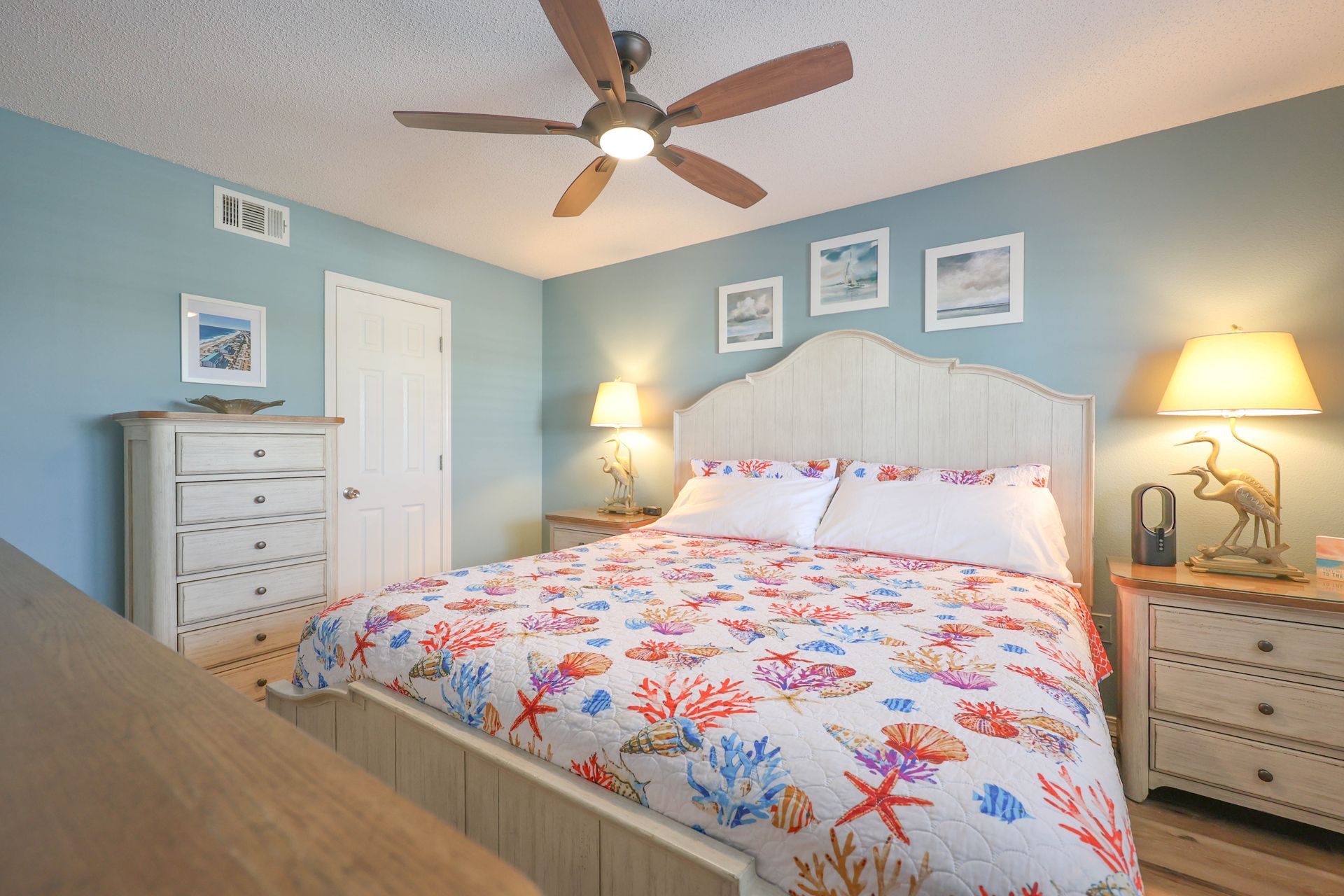 Spacious king bedroom with professionally styled linens in a vacation rental