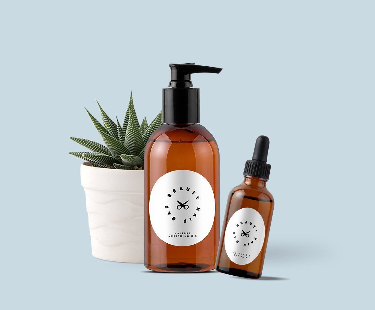 Una botella de loción y un gotero junto a una planta en maceta.