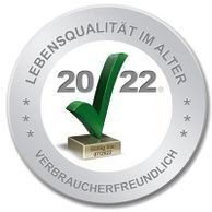 Silver badge with