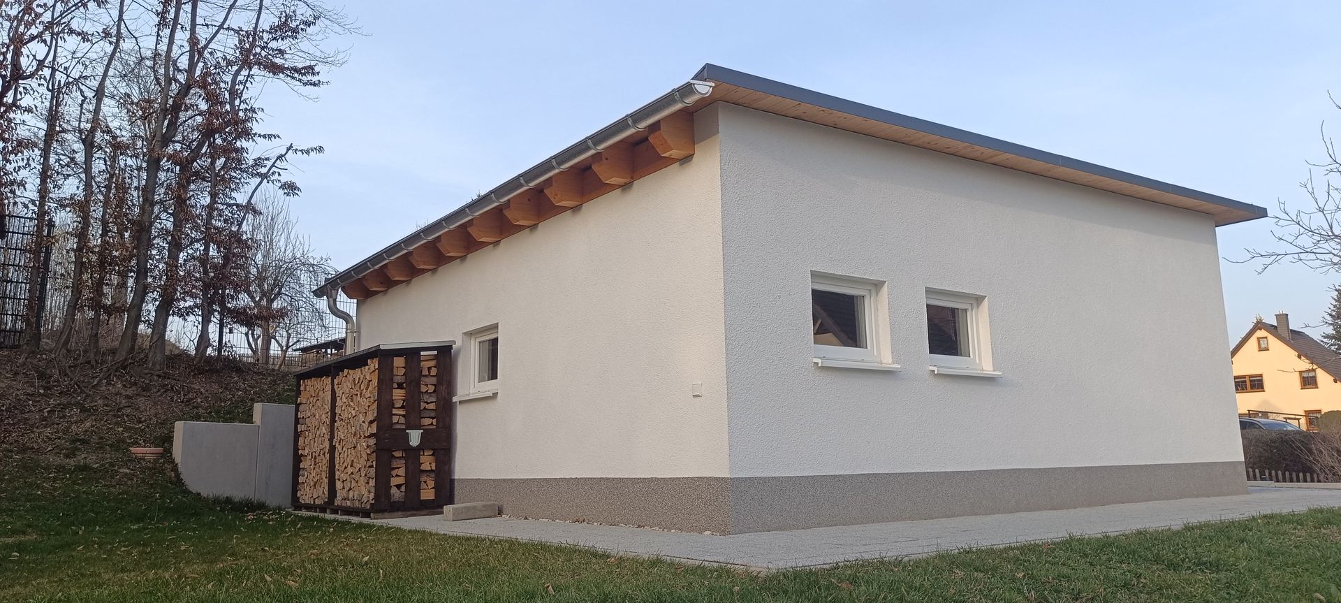 Bau einer Doppelgarage einschl. Gestaltung der Außenanlagen